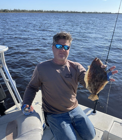 Caught a Flounder—Florida fishing at its best